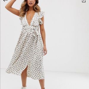Plunge dress w/ ruffled shoulders & smudged spots